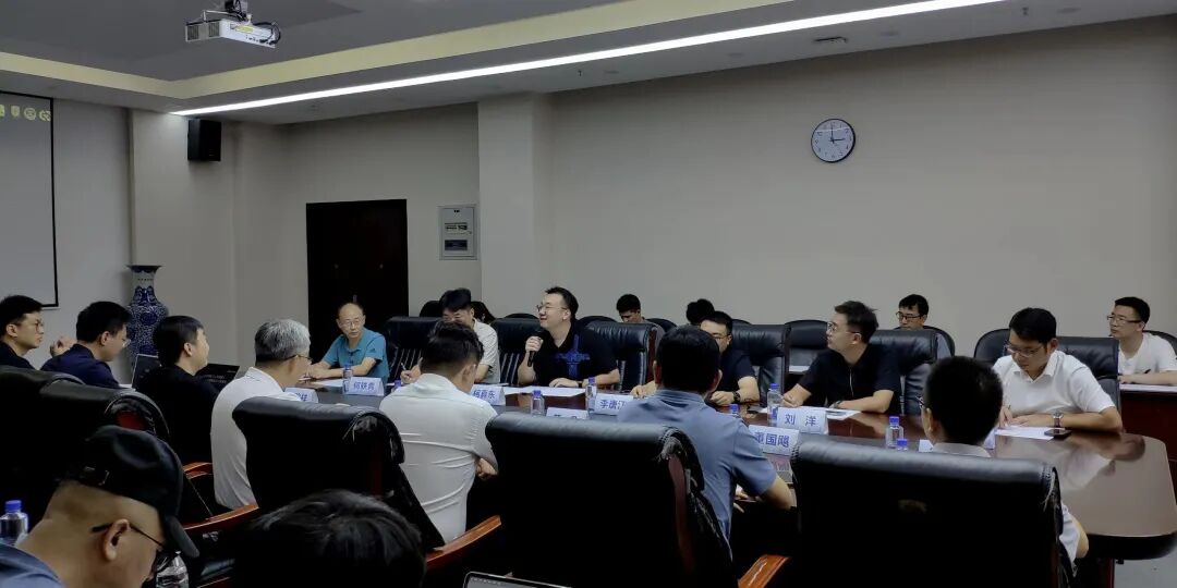 Participants exchange views during the workshop
